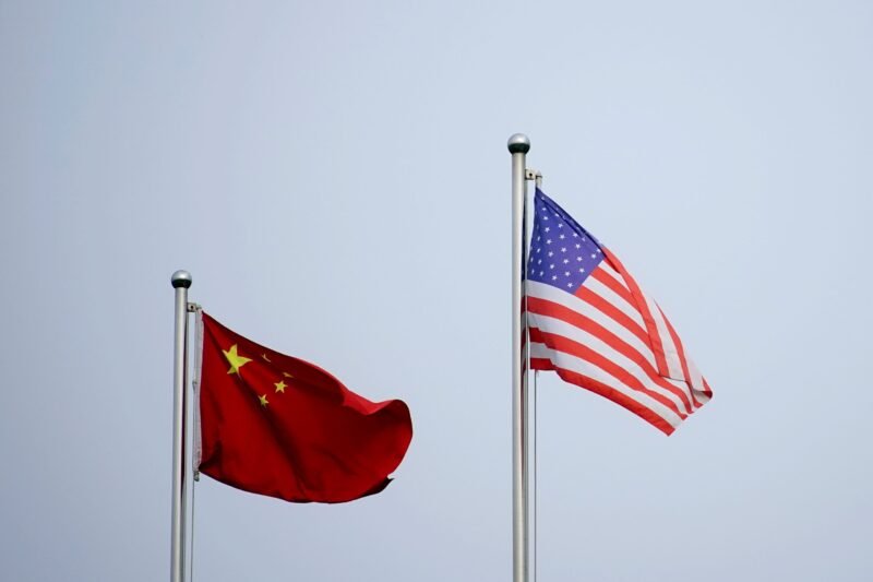 Saudi Arabia offers to mediate between the US & China US CHINA FLAGS scaled 1